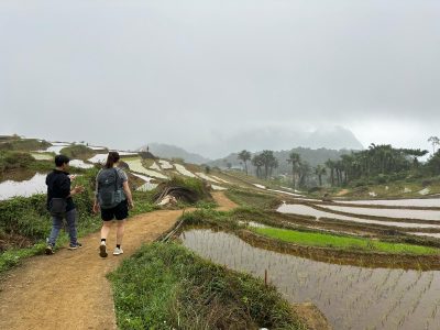 Walking through rice terraces in Pu Luong Nature Reserve