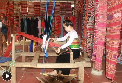 Thai ethnic stilt houses and traditional weaving in Pu Luong