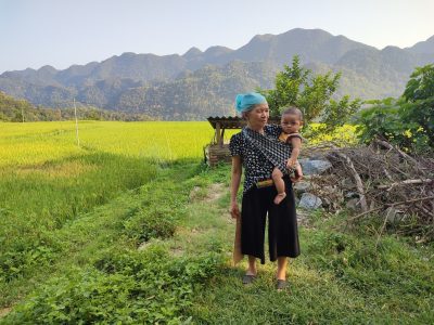sustainable trekking Pu Luong Vietnam walking through rice terraces and local Thai village