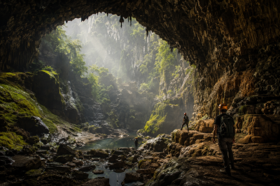 Travelers exploring caves in Phong Nha Vietnam