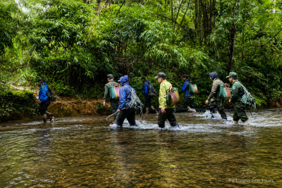 Trekking through the ancient rainforest of Cuc Phuong National Park in Northern Vietnam