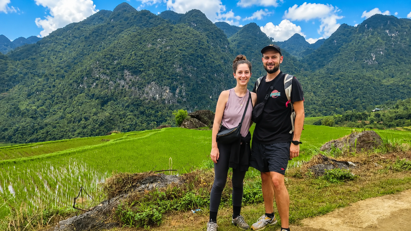 Couple on a private trek through Pu Luong rice fields and limestone mountains
